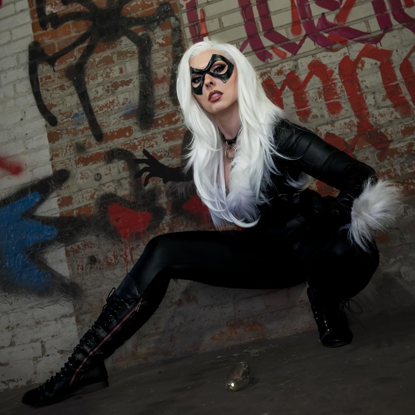 Instagram post by @black_cat_babes for Marvel. Caption reads: [...] #spiderman #spidermancosplay #marvel....