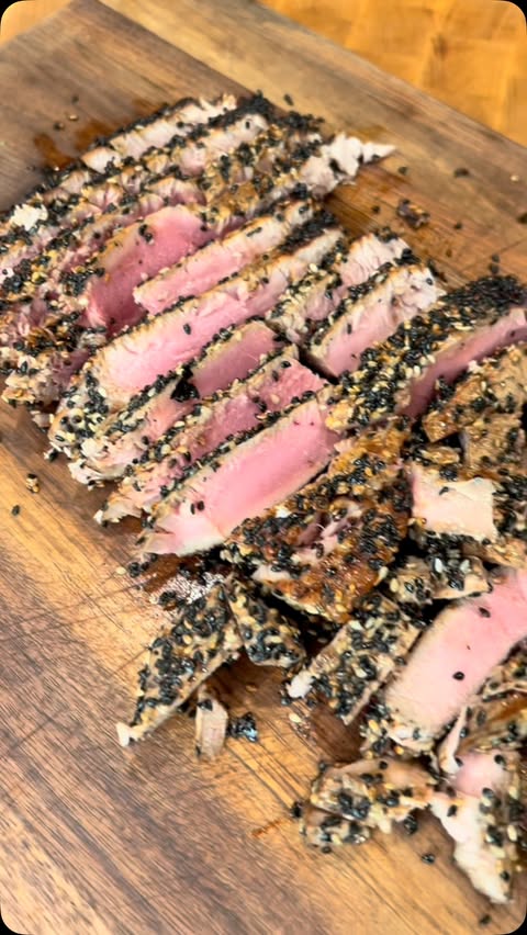 Instagram post by @rivieraseafoodclub for New West KnifeWorks. Caption reads: Sesame-Crusted Ahi Tuna w/ Creamy Ginger Soy....
