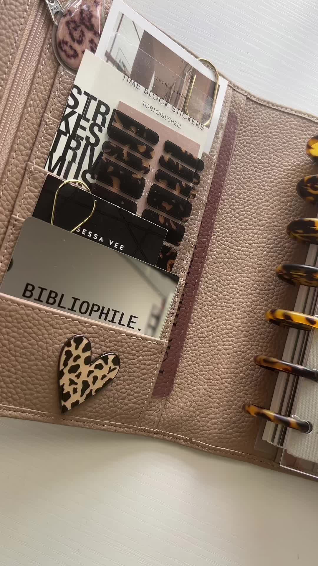 TikTok post by @bryannalesia for Clothandpaper. Caption reads: It’s time to start a new planner. Here’s my....