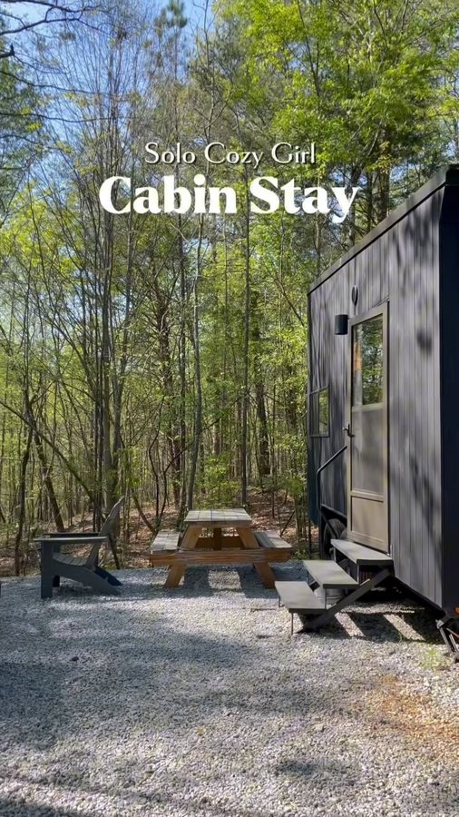 Instagram post by @afrozuri_ for Postcard Cabins. Caption reads: [...] stay , I highly recommend booking a....