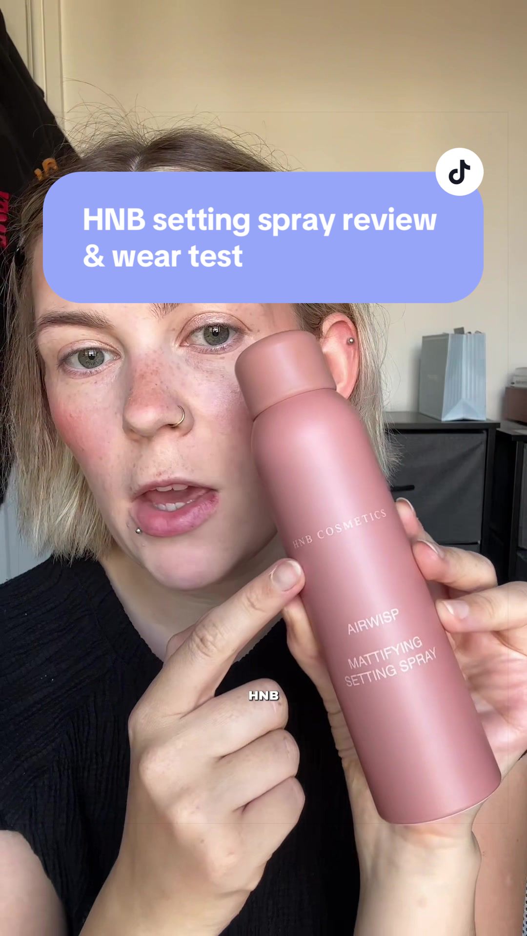 TikTok post by @honestphoebe for HNB Cosmetics. Caption reads: [...] Setting Spray from @HNB Cosmetics #hnb....