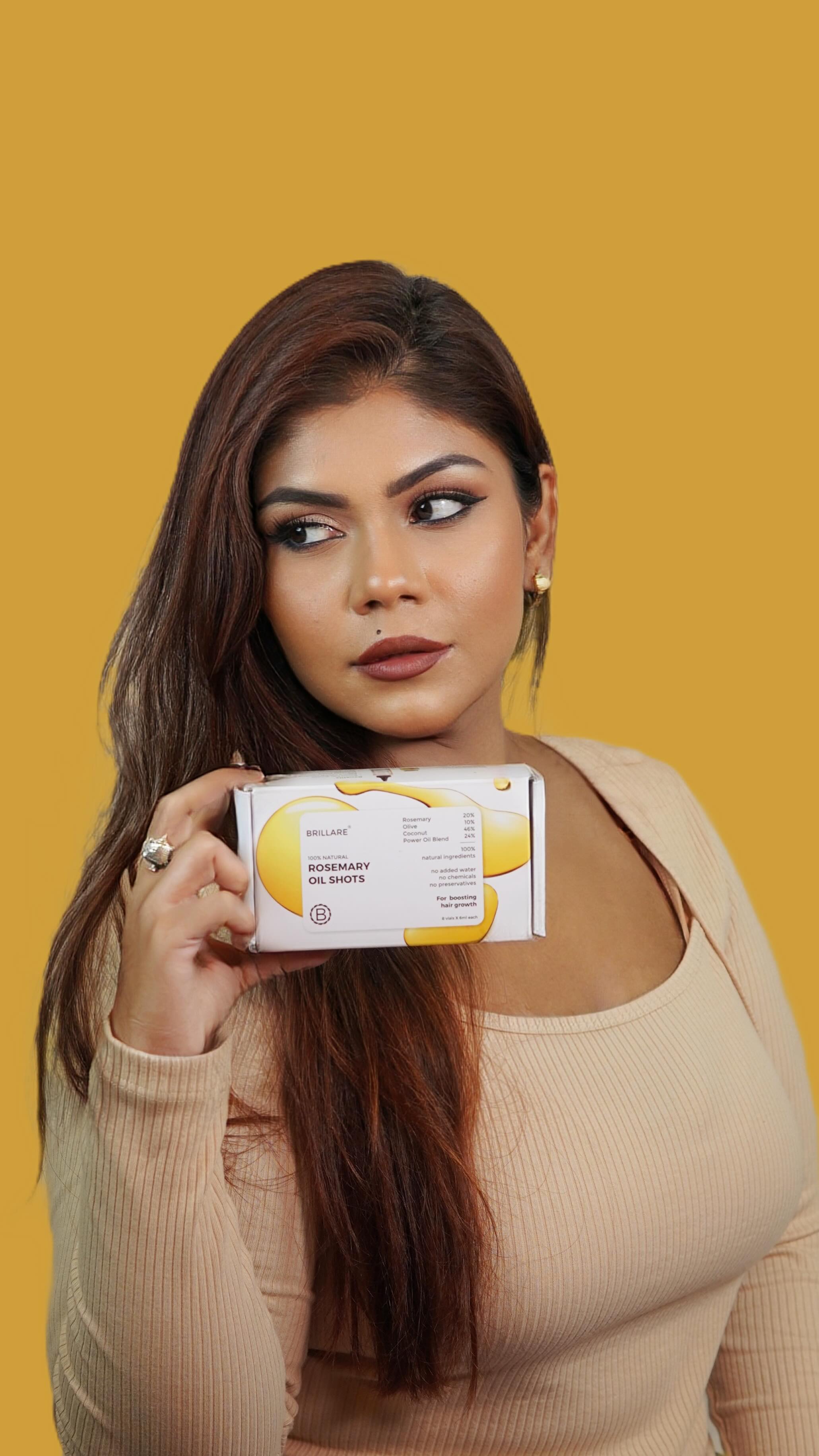 Instagram post by @rweehmaroy for Brillare. Caption reads: Level up your hair game with Brillare Rosemary Oil....