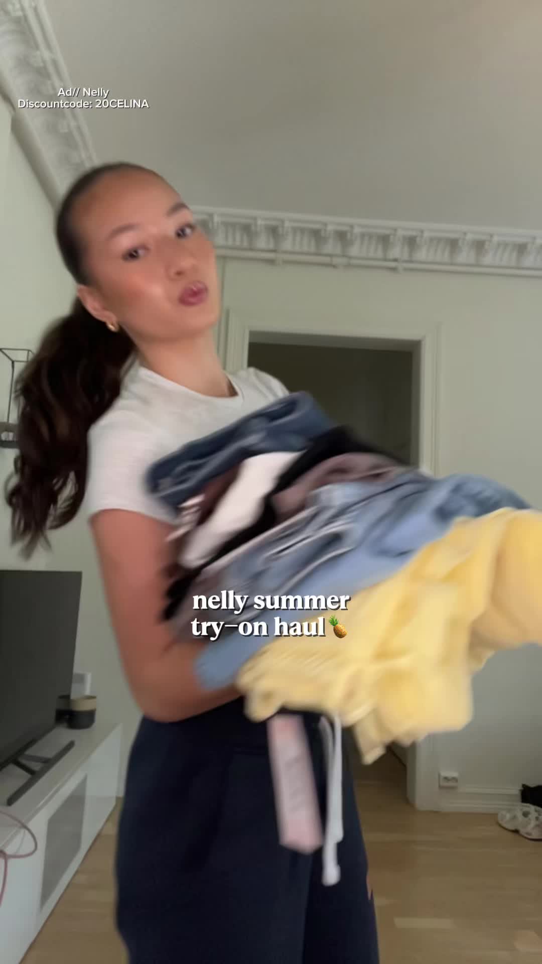TikTok post by @celinagretland for Nelly. Caption reads: Ad// @NELLY.COM | Nelly summer try on haul🍍💛....
