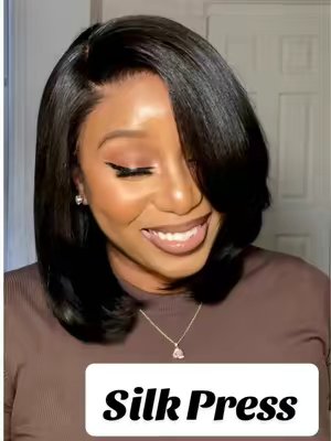 TikTok post by @kenishaelita for Nadula. Caption reads: GIRLS it’s Silk press SEASONNN 😍😍 @NadulaHair....