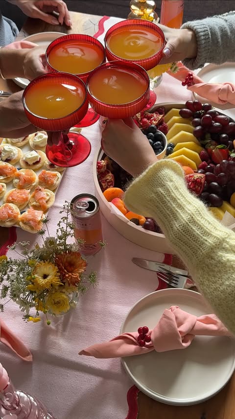Instagram post by @kateehazeldine for Henlee. Caption reads: [...] a fruit & floral friendmas with....