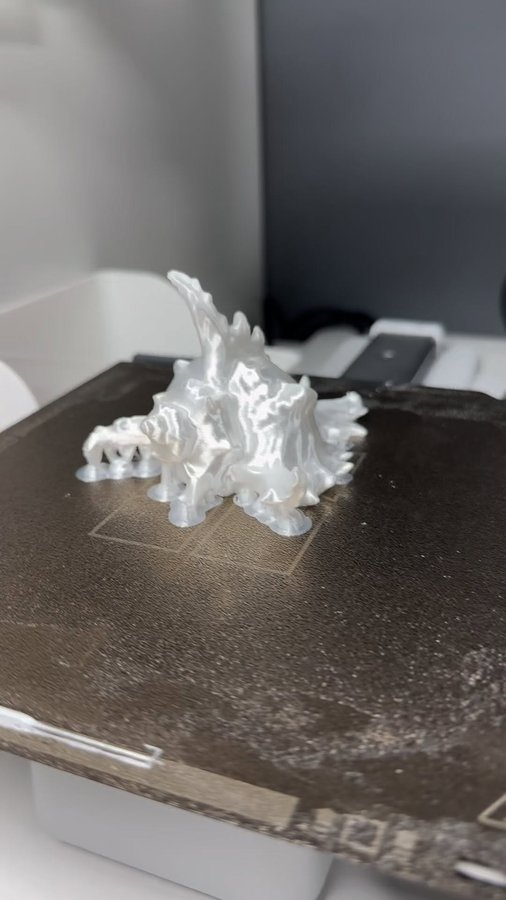 Instagram post by @davidkrammer for Amolen. Caption reads: I LOVE this White Silk PLA Filament! 🤯 #shorts....