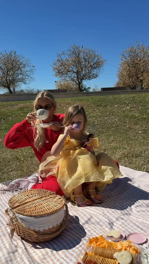 Instagram post by @maeg_thompson for Disney. Caption reads: [...] our play date at the park. shop for your....