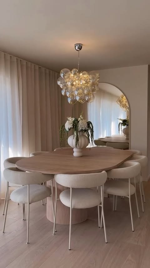 Instagram post by @regine_monet.fit for West Elm. Caption reads: [...] Oval Concrete Dining Table (84”) from....