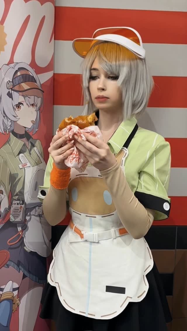 Instagram post by @theemberwolf for Zenless Zone Zero. Caption reads: #AD Everyone knows Anby can’t resist a burger 🍔....