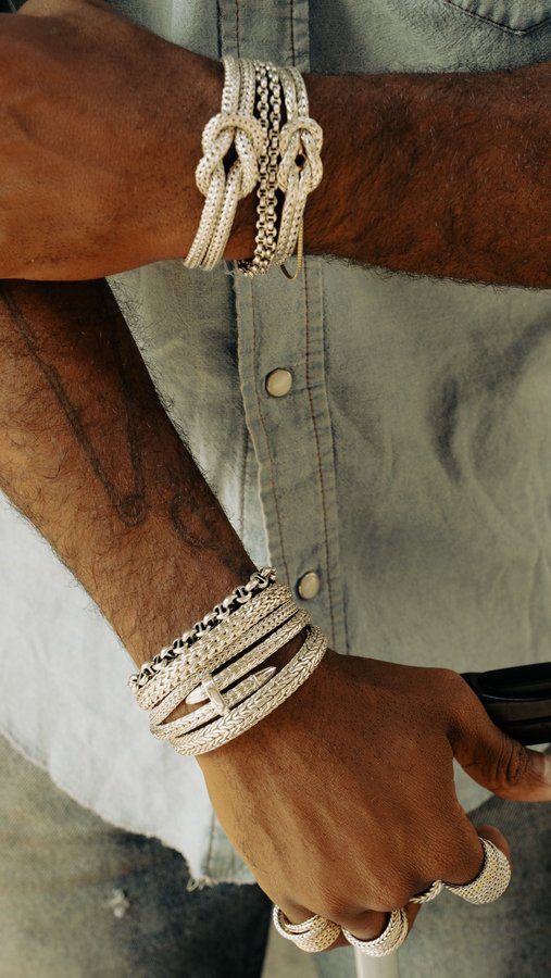 Instagram post by @justinb00ne for John Hardy. Caption reads: [...] the destination, a timeless stack from....