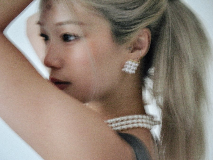 Instagram post by @nuriamaa for TASAKI. Caption reads: Oh my pearls! @tasaki_intl 🫧.