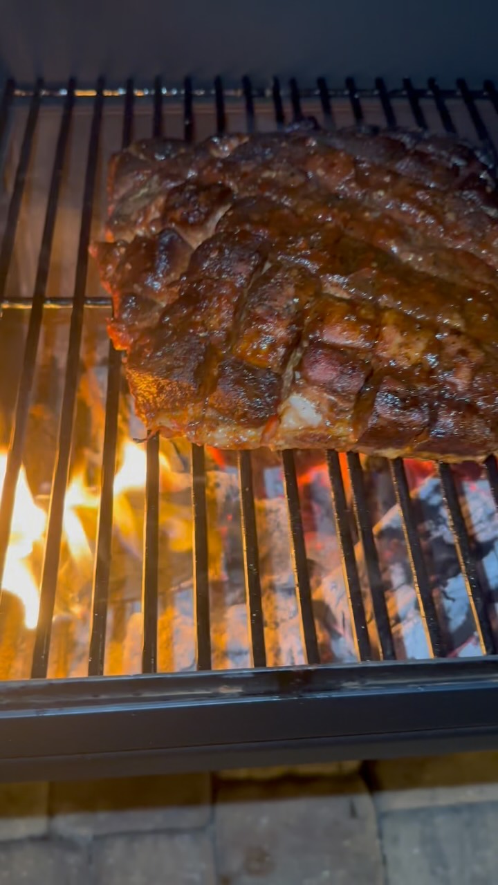 Instagram post by @blood.smoke.beers_bbq for Heath Riles BBQ. Caption reads: 🔥 Smoked Pork Belly Perfection 🔥
Started with a....