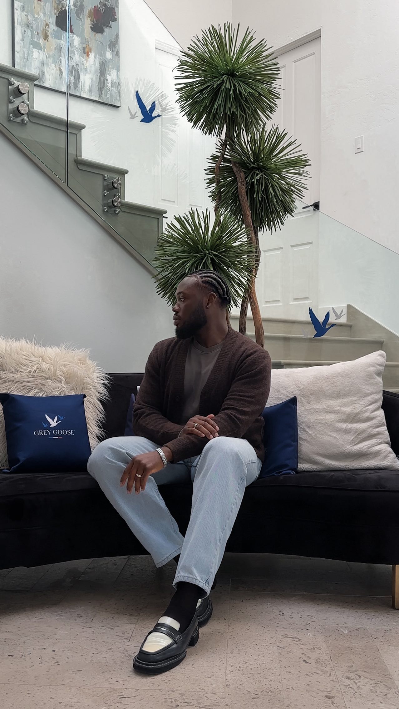 Instagram post by @adeeowoseni for Grey Goose. Caption reads: [...] poolside or on the dance floor, @greygoose....