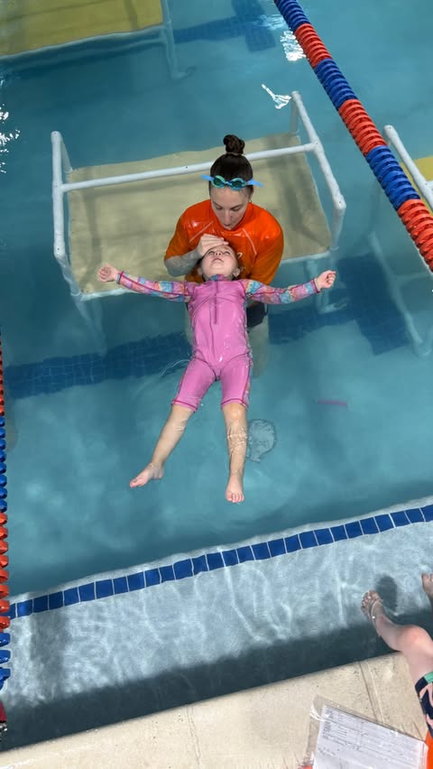 Instagram post by @memory.making.mama.nj for Goldfish Swim School. Caption reads: 🏊‍♀️💦 You NEED to watch the end of this video to....