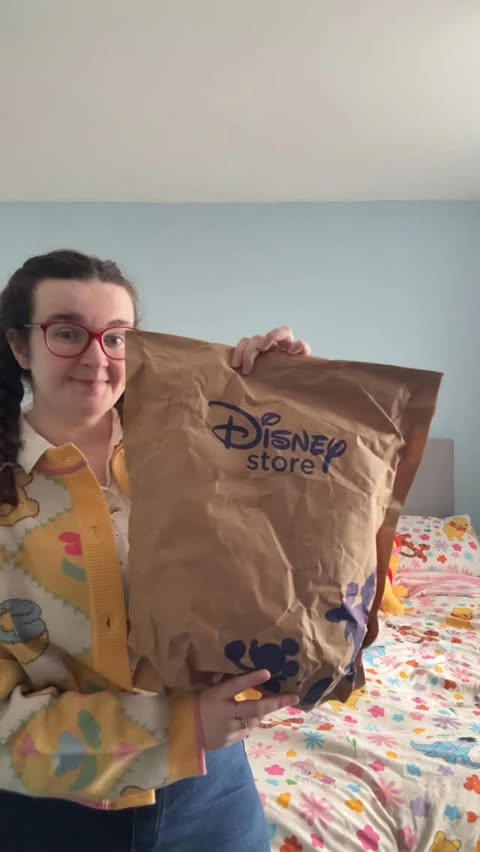 Instagram post by @lizeindisney for Disney Store. Caption reads: Unbox my @disneystoreuk order with me 📦 I know....