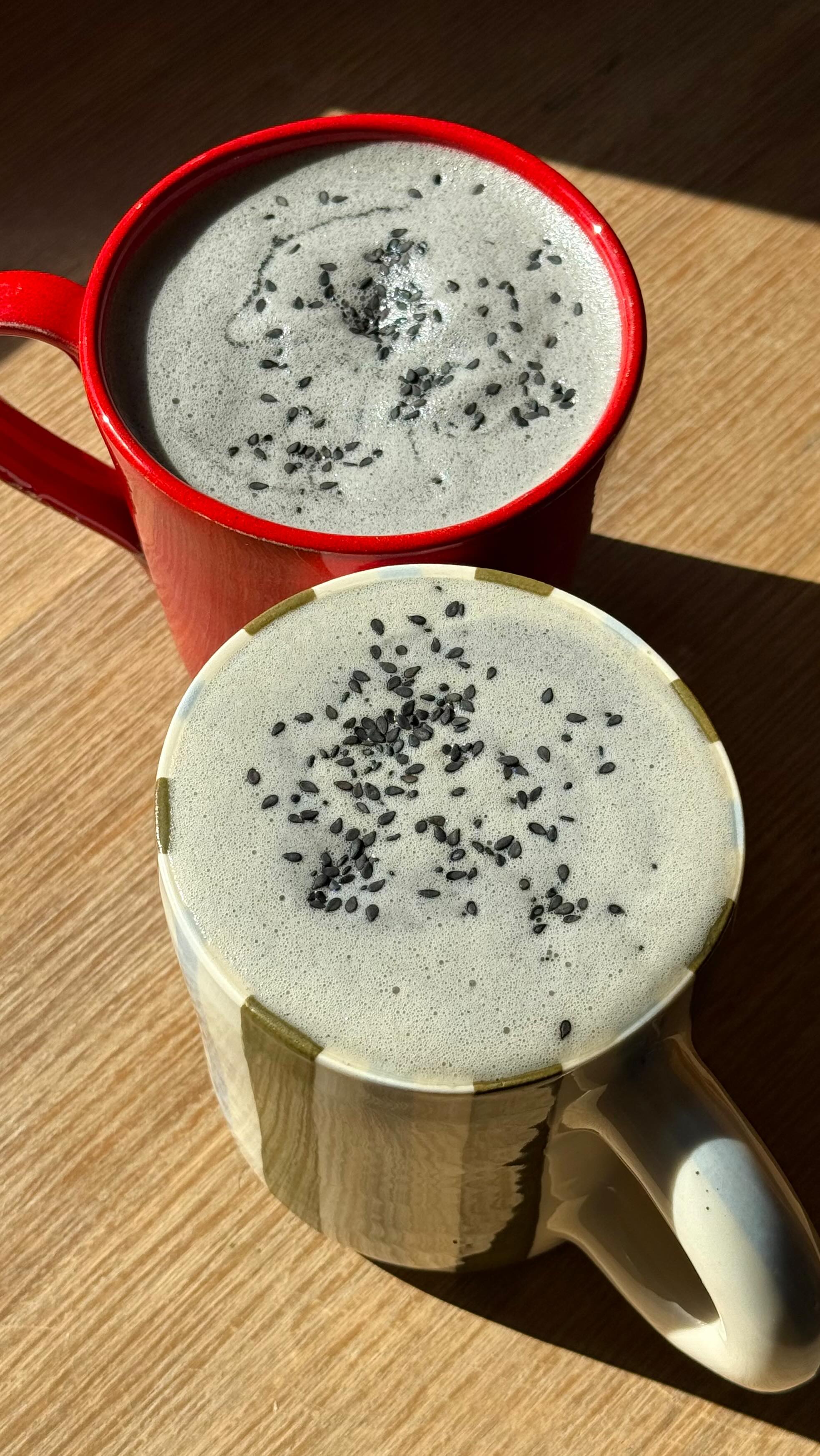 Instagram post by @glowwithella for Califia Farms. Caption reads: Black Sesame London Fog 🫖☁️

Made with the....