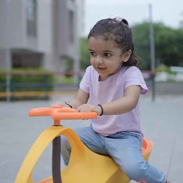 Instagram post by @ekta.mk for LuvLap. Caption reads: Let your little one ride into sunshine and smiles....