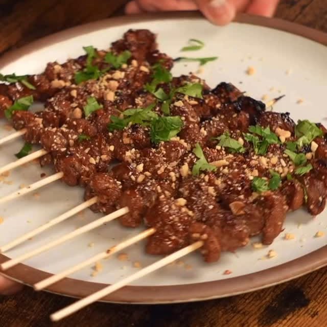 Instagram post by @gidsgids for Impossible Foods. Caption reads: These lemongrass beef skewers hit every note -....
