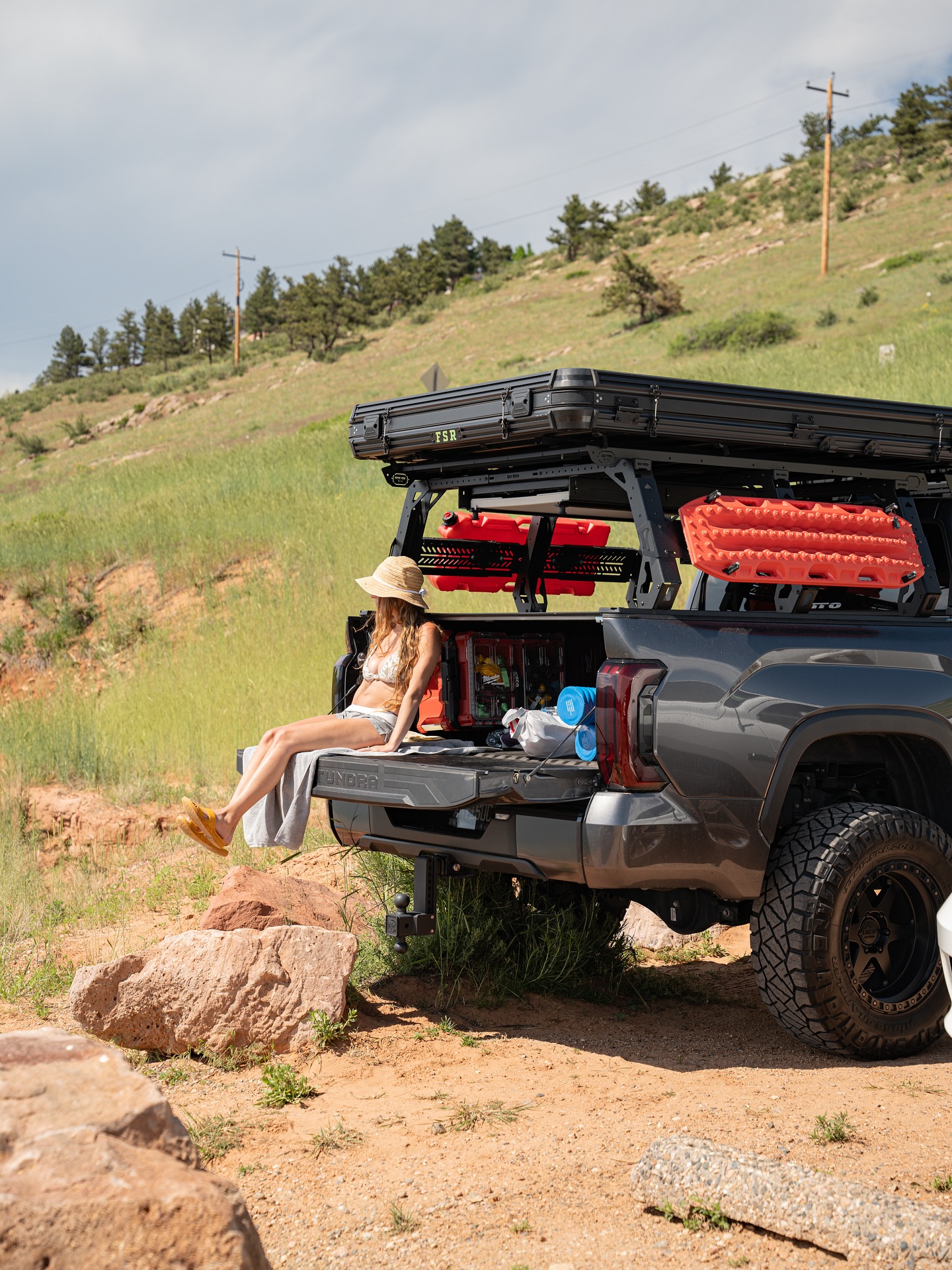 Instagram post by @uptopoverland for Toyota USA. Caption reads: Taking the essentials out to the lake! Can’t tell....