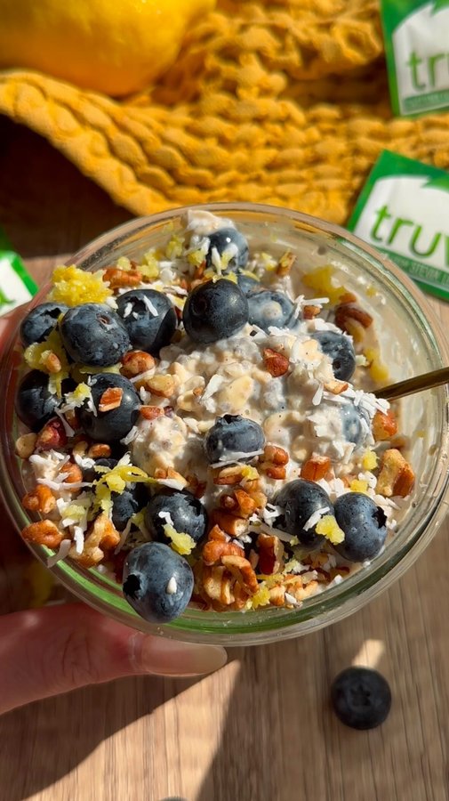 Instagram post by @wholesomelysophia for Truvia. Caption reads: BLUEBERRY LEMON OVERNIGHT OATS 🫐✨🍋 the ultimate....