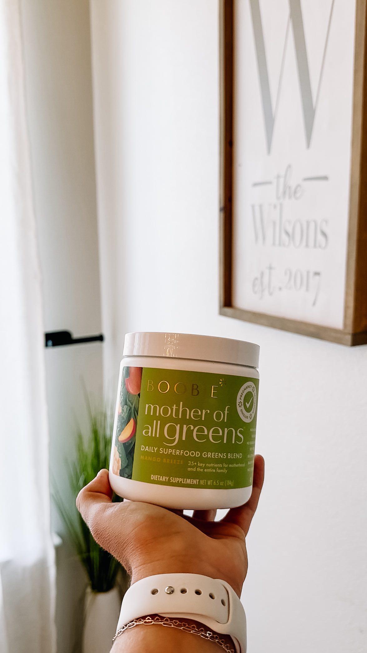 Instagram post by @lifewiththewilsonfam for Boobie Superfoods. Caption reads: [...] greens in on the daily with....