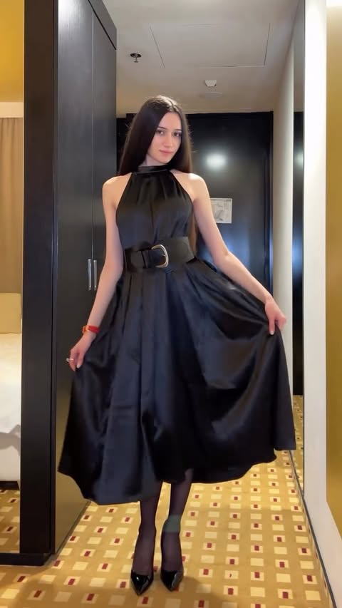 Instagram post by @m_angelina_k for Uoozee. Caption reads: [...] every corner of your heart 

dress....