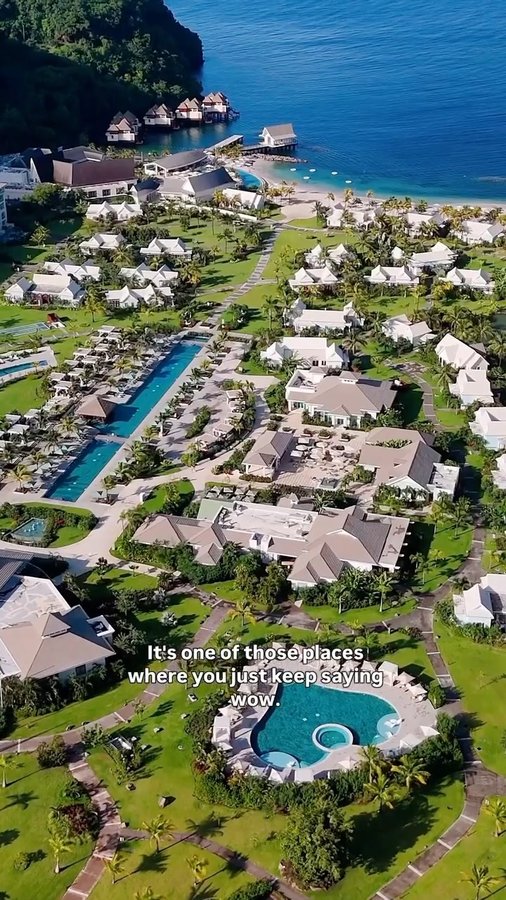 Instagram post by @glamofnyc for Sandals Resorts. Caption reads: Why Sandals Saint Vincent Belongs on Your Luxury....