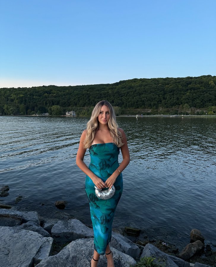 Instagram post by @megkapral for 12th Tribe. Caption reads: [...] a mermaid in this dress 🧜‍♀️🩵....