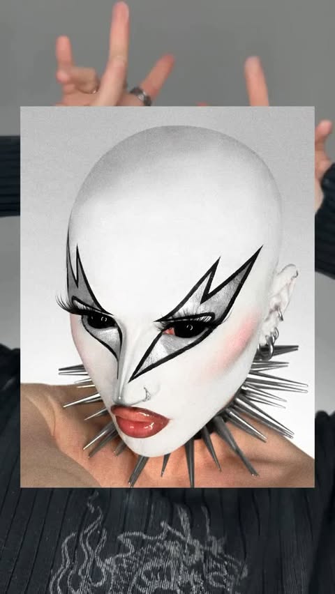 Instagram post by @bo.quinn for Mehron Makeup. Caption reads: obsessed with this silver pigment by @mehronmakeup....