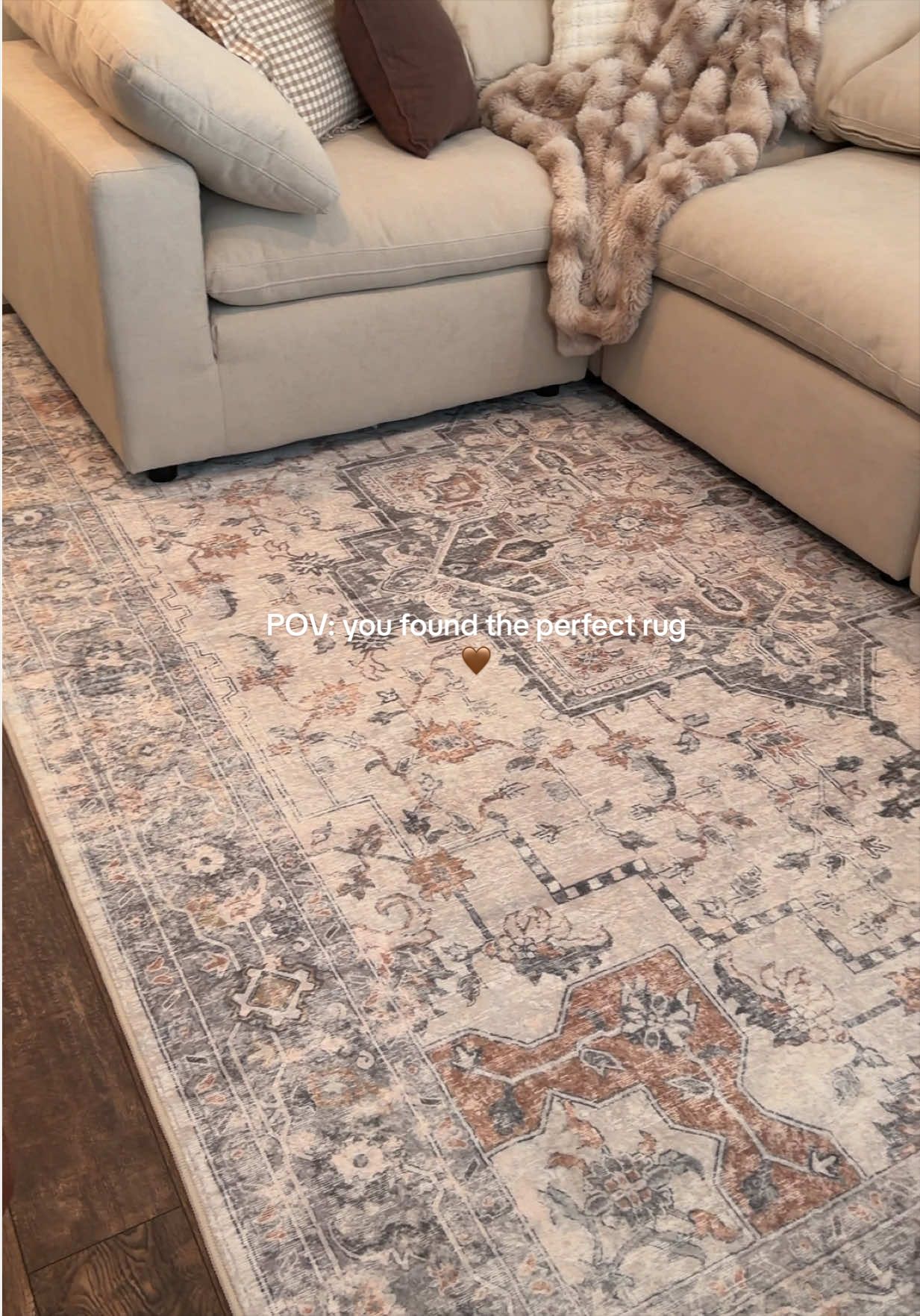 TikTok post by @jenny.cad for Genimo. Caption reads: [...] rug is perfect for our home 💆🏻‍♀️🤎....
