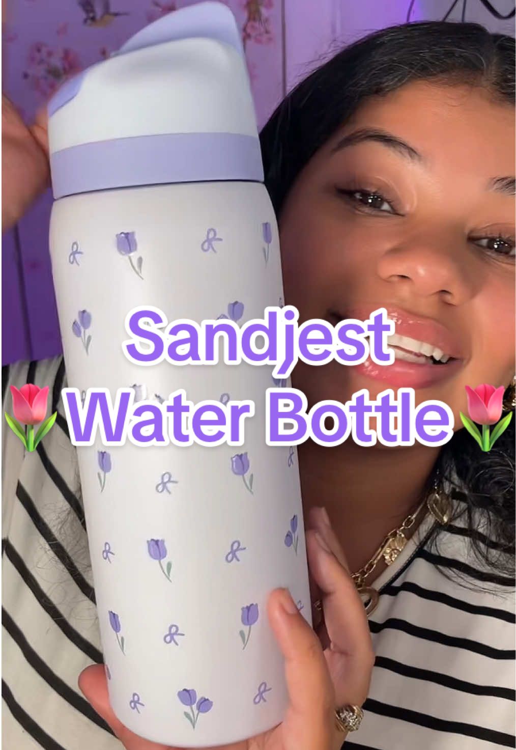 TikTok post by @itsallemilyevans for Sandjest. Caption reads: @SANDJEST #sandjest #sandjesttumbler #waterbottle....