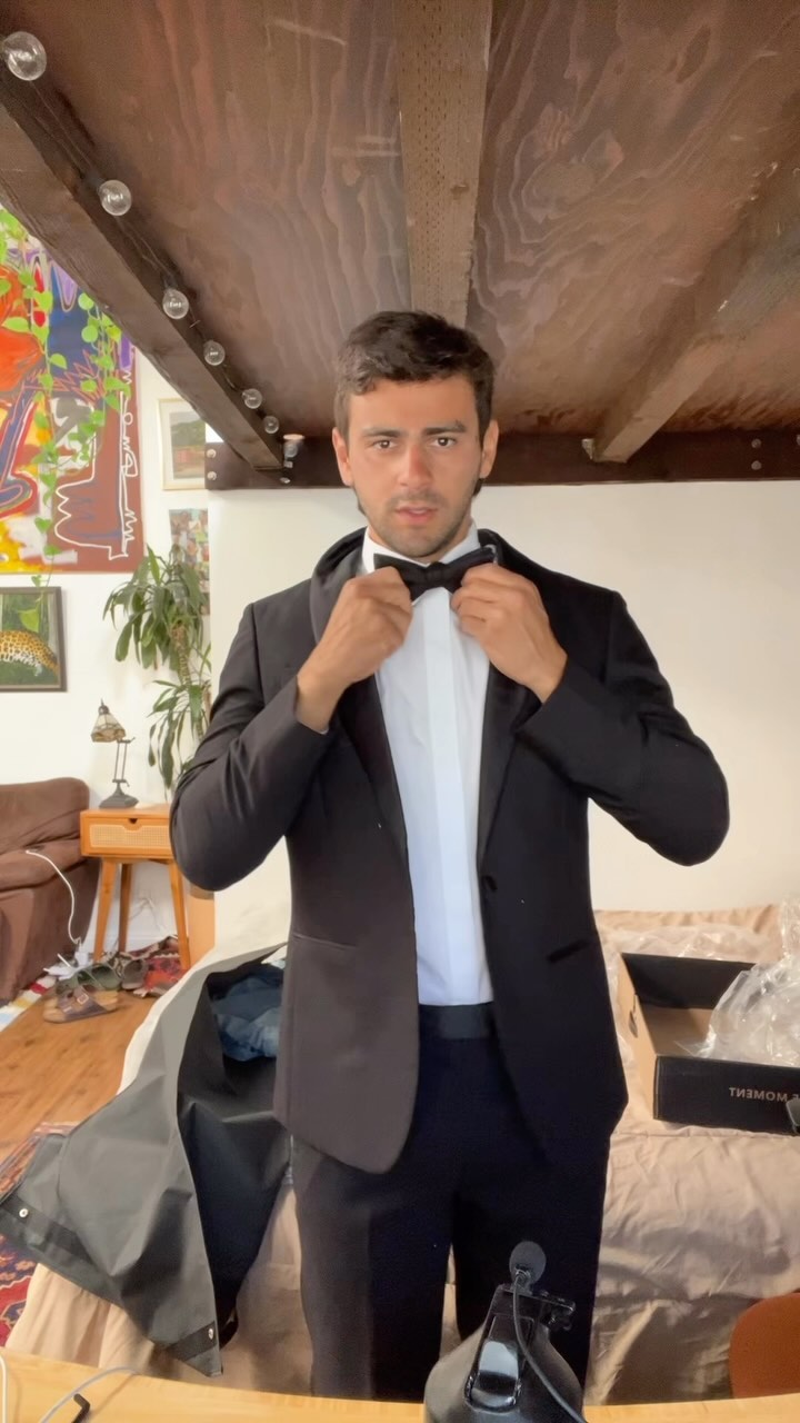 Instagram post by @noahxangelo for The Black Tux. Caption reads: [...] clean this wedding season thanks to....