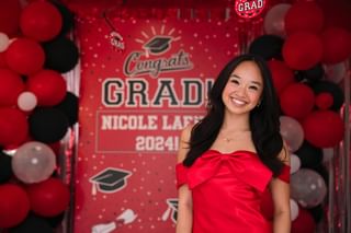 Instagram post by @nicolelaeno for Party City. Caption reads: Best grad party evaaaa with the best decorations....