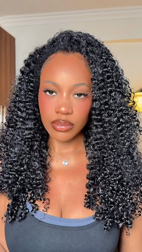 Instagram post by @mikaimcdermott for John Frieda US. Caption reads: AD. every curly routine is different, but there....