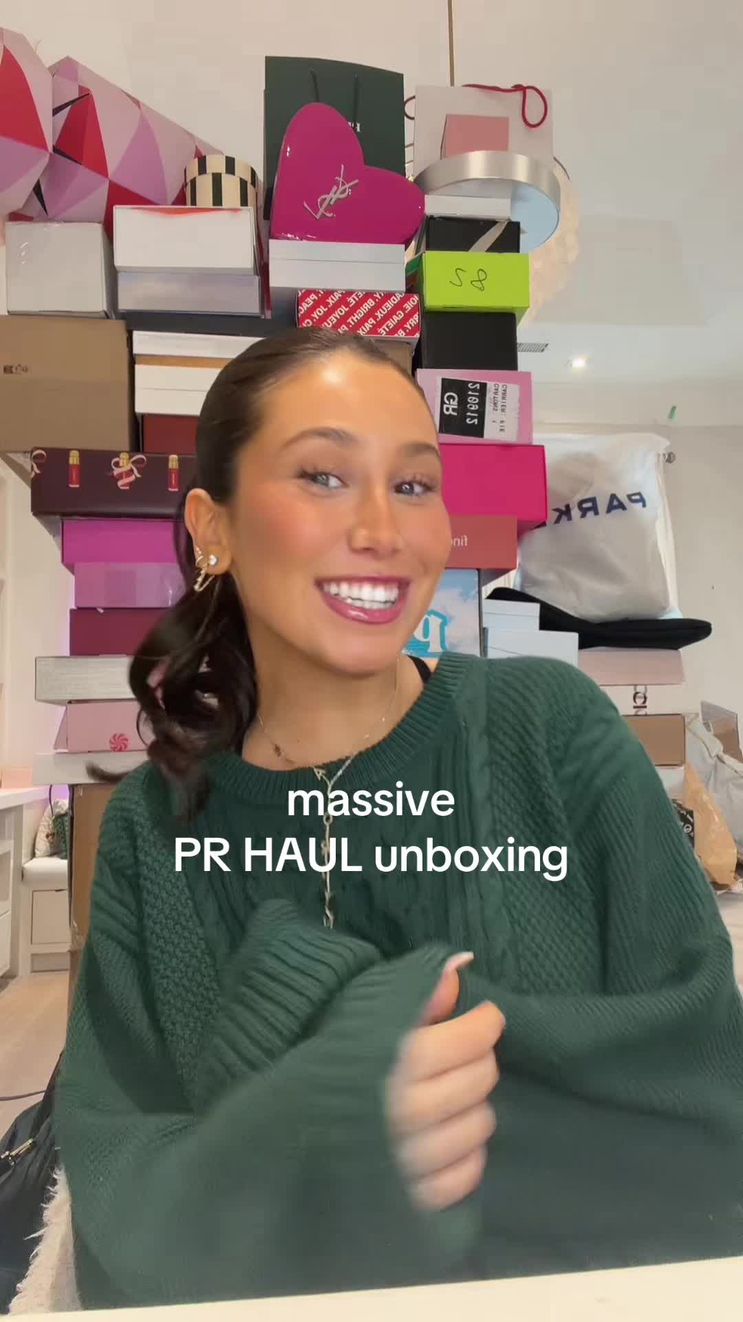 TikTok post by @emma__jordyn for Moroccanoil. Caption reads: PR HAUL TIME! 🤩 #pr #unboxing #prhaul #haul....