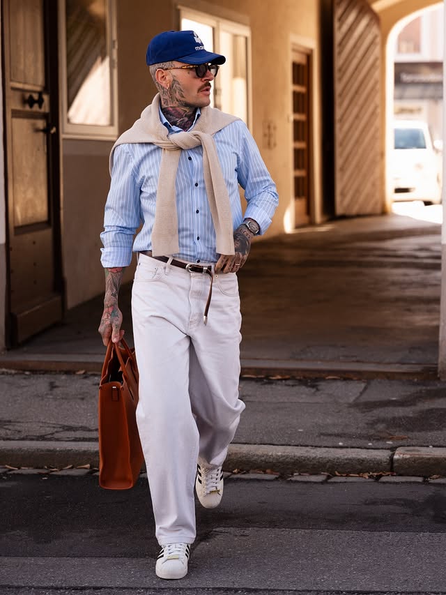 Instagram post by @moritz.taylor for Olymp. Caption reads: Styling elegant sportswear for @olympmen SS26. 👔....