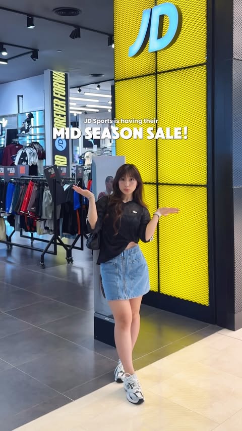 Instagram post by @solelybyirene for JD Sports. Caption reads: @jdsportsmy Mid-Season Sale is CALLING you! 🛍️✨....