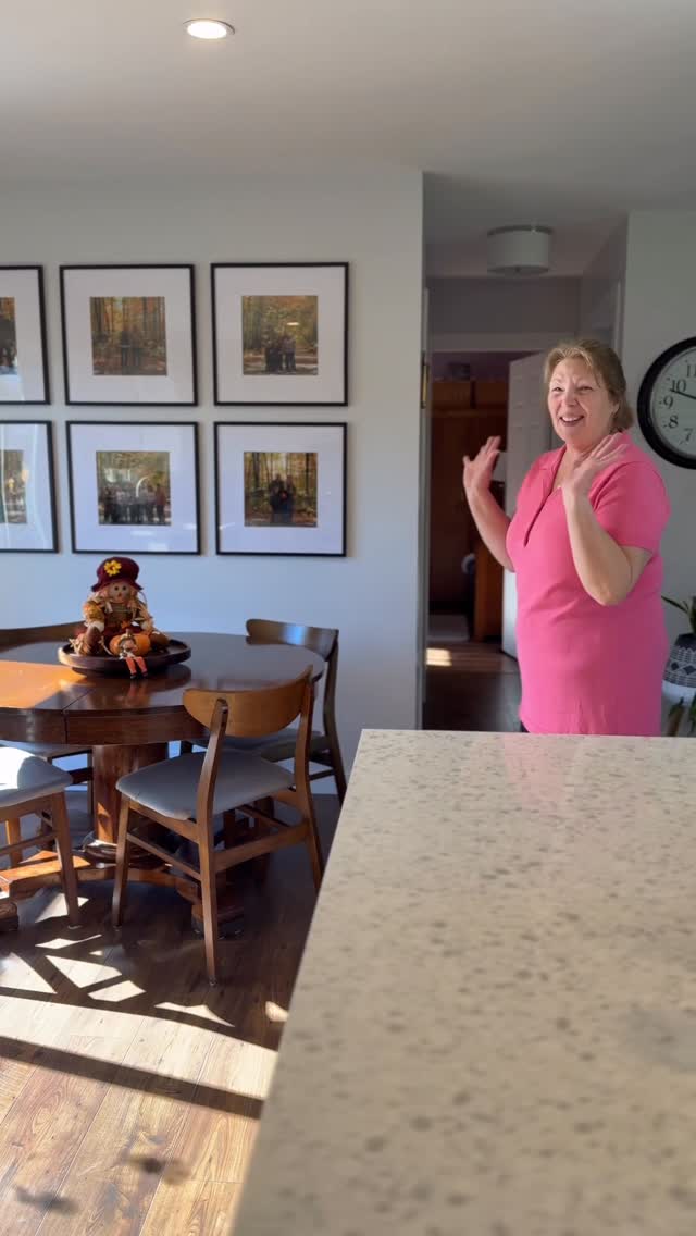 Instagram post by @sashaharrison12 for Opposite Wall. Caption reads: We surprised Mom with a photo wall for her....