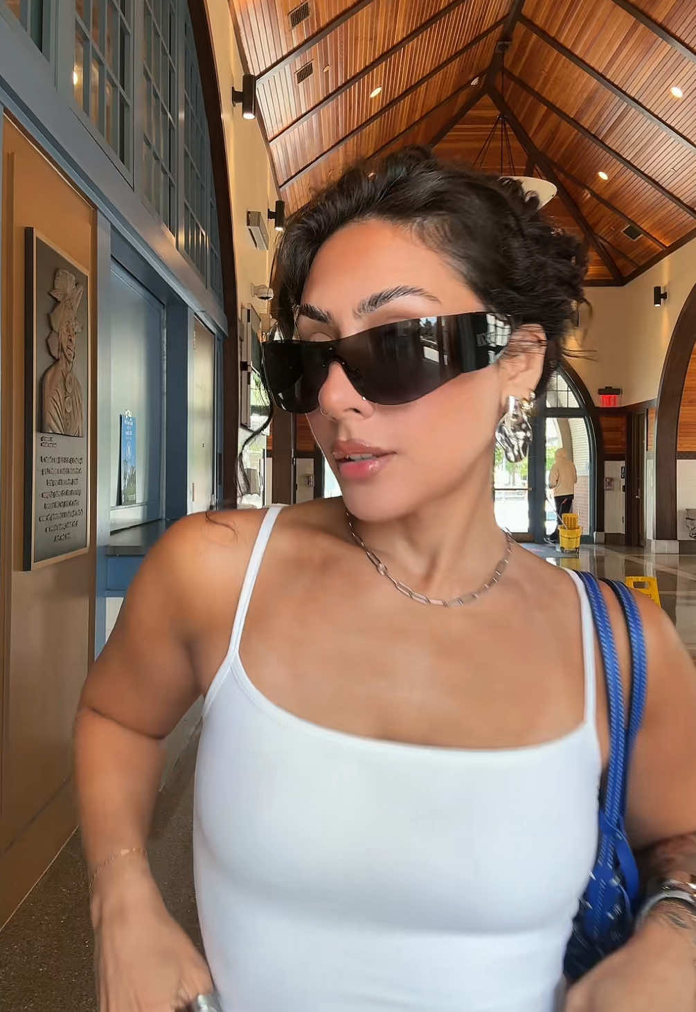 TikTok post by @tatiismamii for DEZI. Caption reads: glasses of the day @DEZI EYEWEAR.