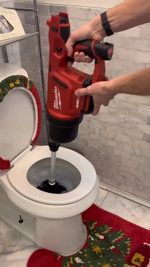 Instagram post by @plumbhero1 for Milwaukee Tool. Caption reads: Milwaukee Air Snake to unclog a toilet!.