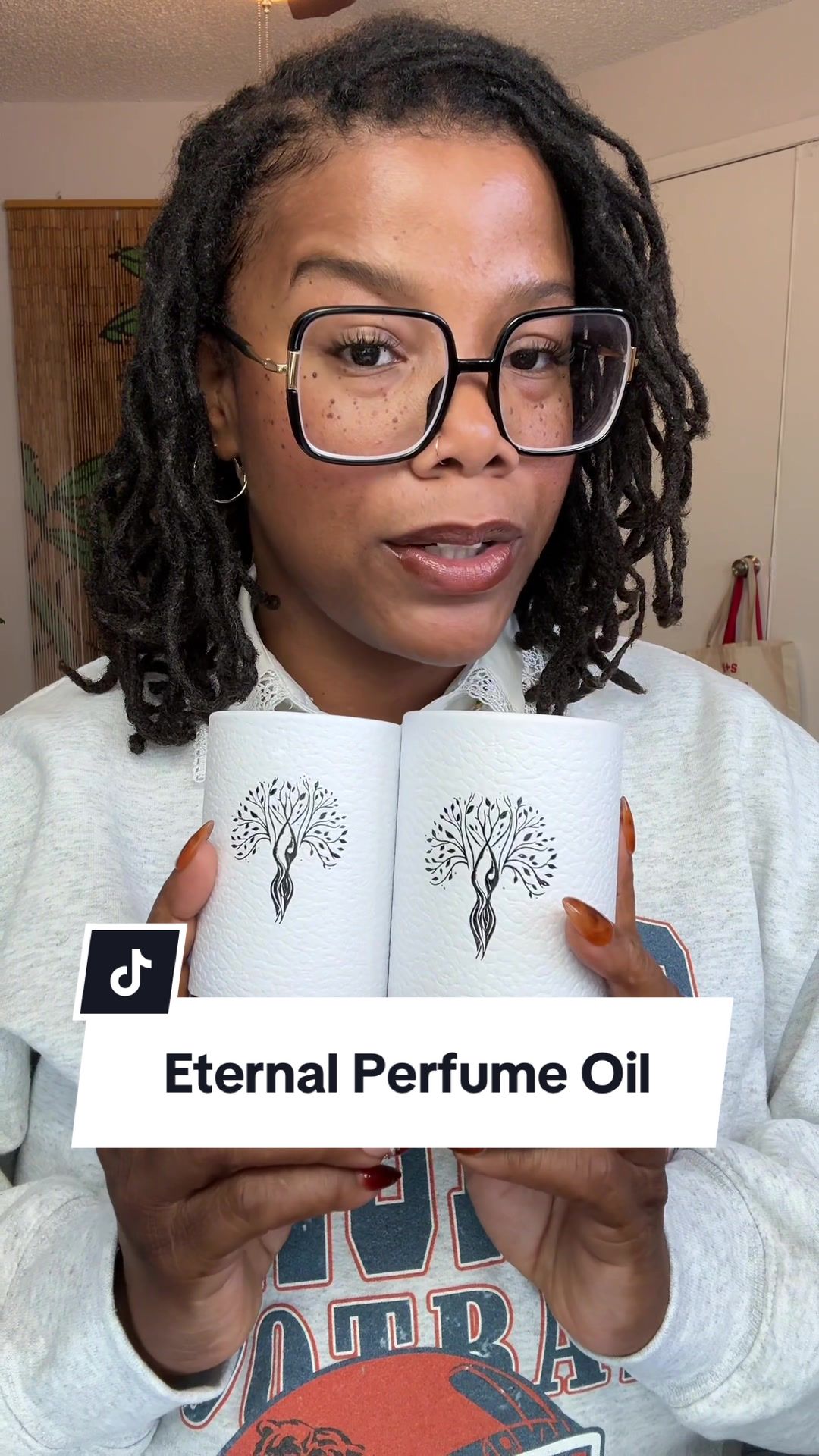 TikTok post by @lilmissfineandferal for Eternal Perfume Oils. Caption reads: @Eternal Perfume Oils  #perfumetiktok #perfumeoil .