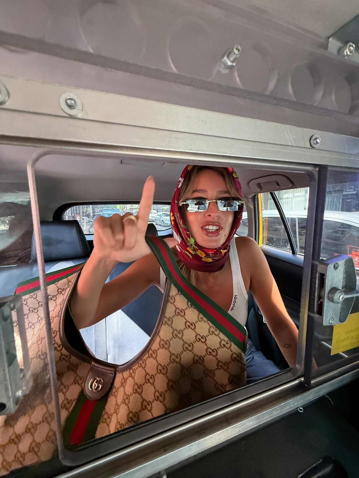Instagram post by @izzipoopi for GUCCI. Caption reads: @gucci Giglio on the GO 

#Gucci #GucciGiglio.