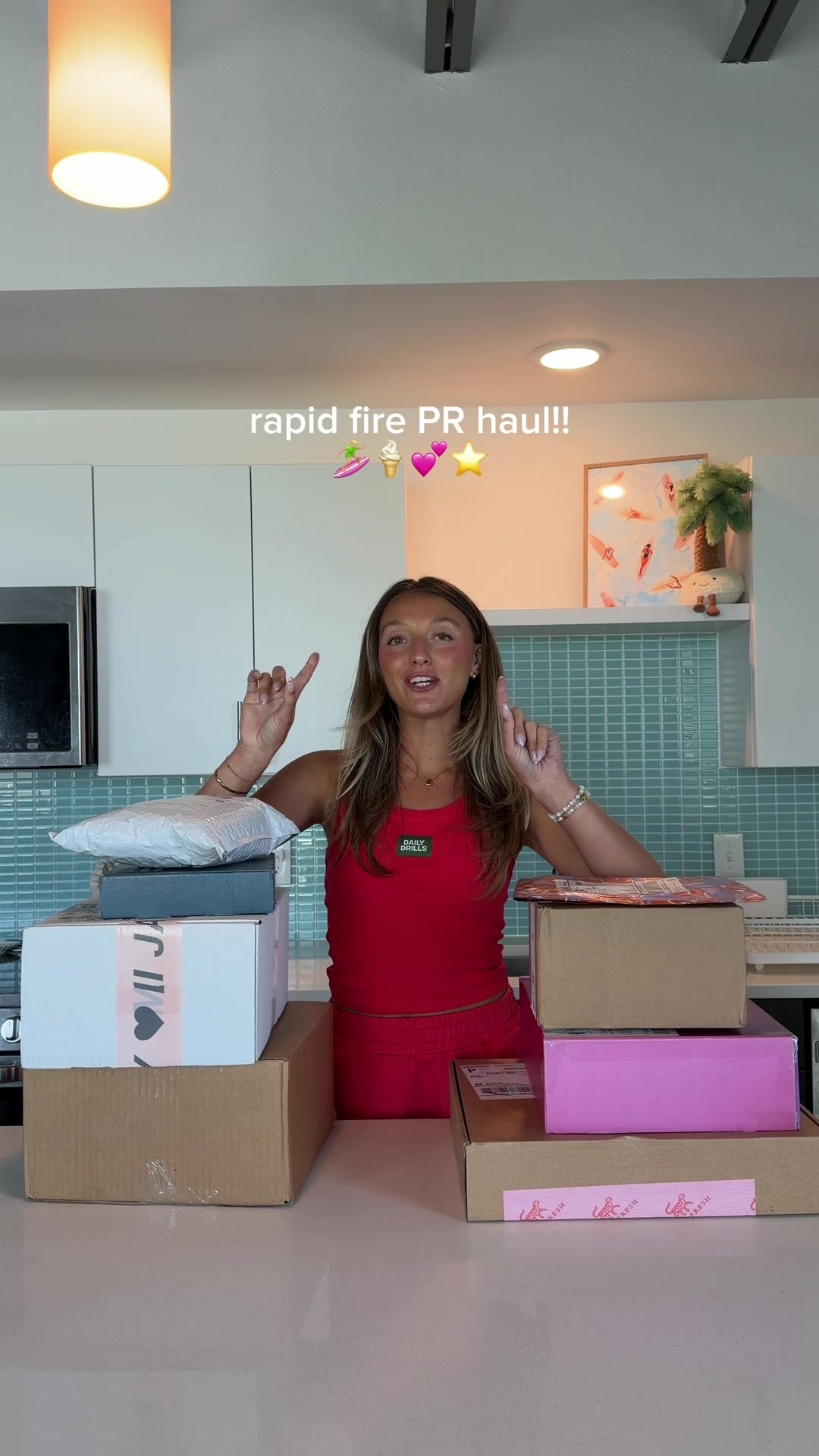 TikTok post by @alain.jannette for Emi Jay. Caption reads: rapid fire PR unboxing!!! 🤪📦 @Emi Jay @Leni....