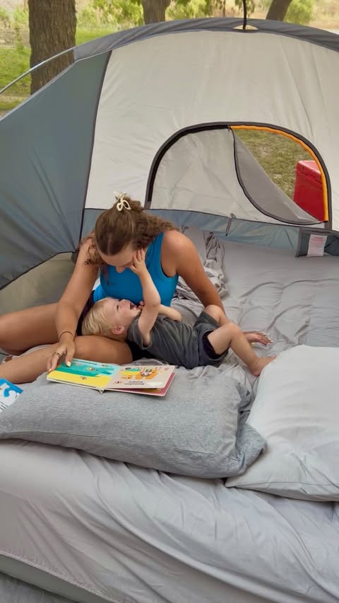 Instagram post by @itsmaddiecox for Joie Baby Gear. Caption reads: we might be crazy for taking our 16mo camping, but....