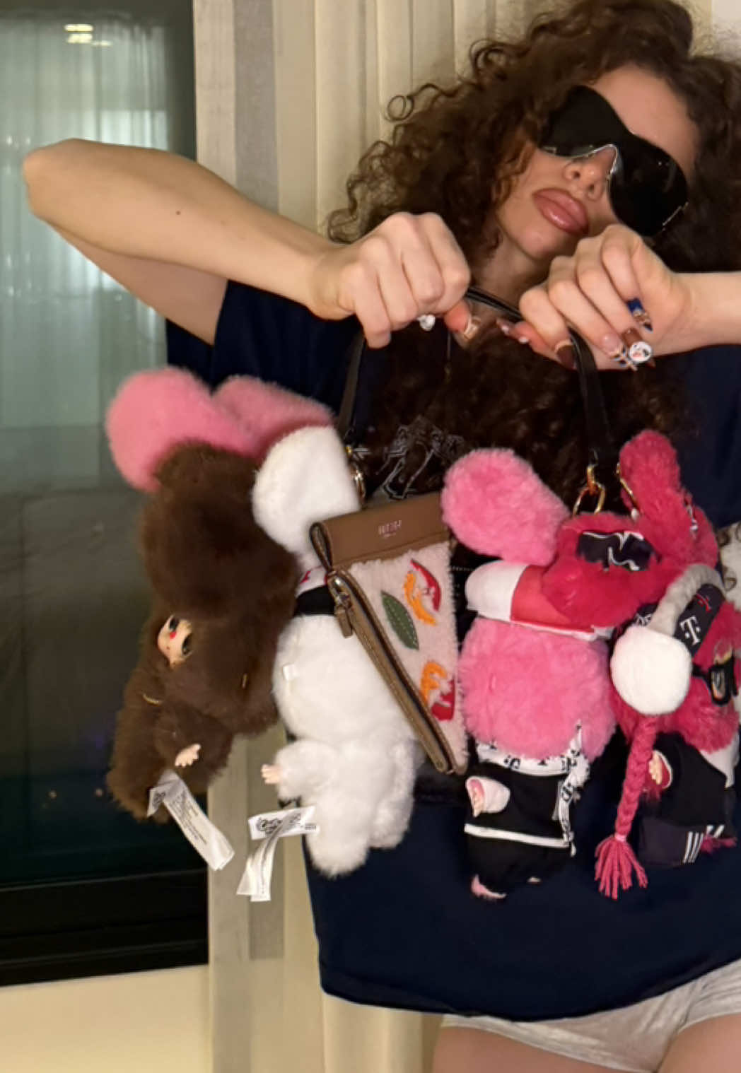 TikTok post by @demitrakalogeras for T-Mobile. Caption reads: Buy your own @T-Mobile x Baby Three on Dec 13th at....