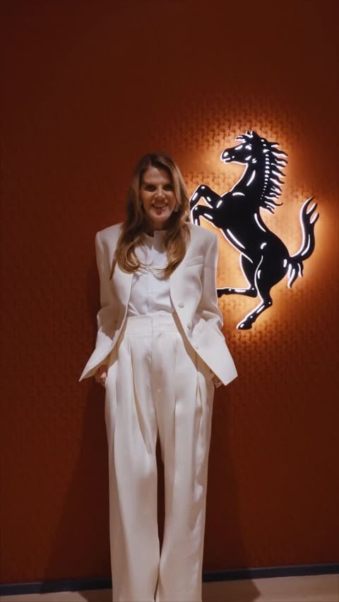 Instagram post by @annadellorusso for Ferrari. Caption reads: [...] to explore the 10th collection of....