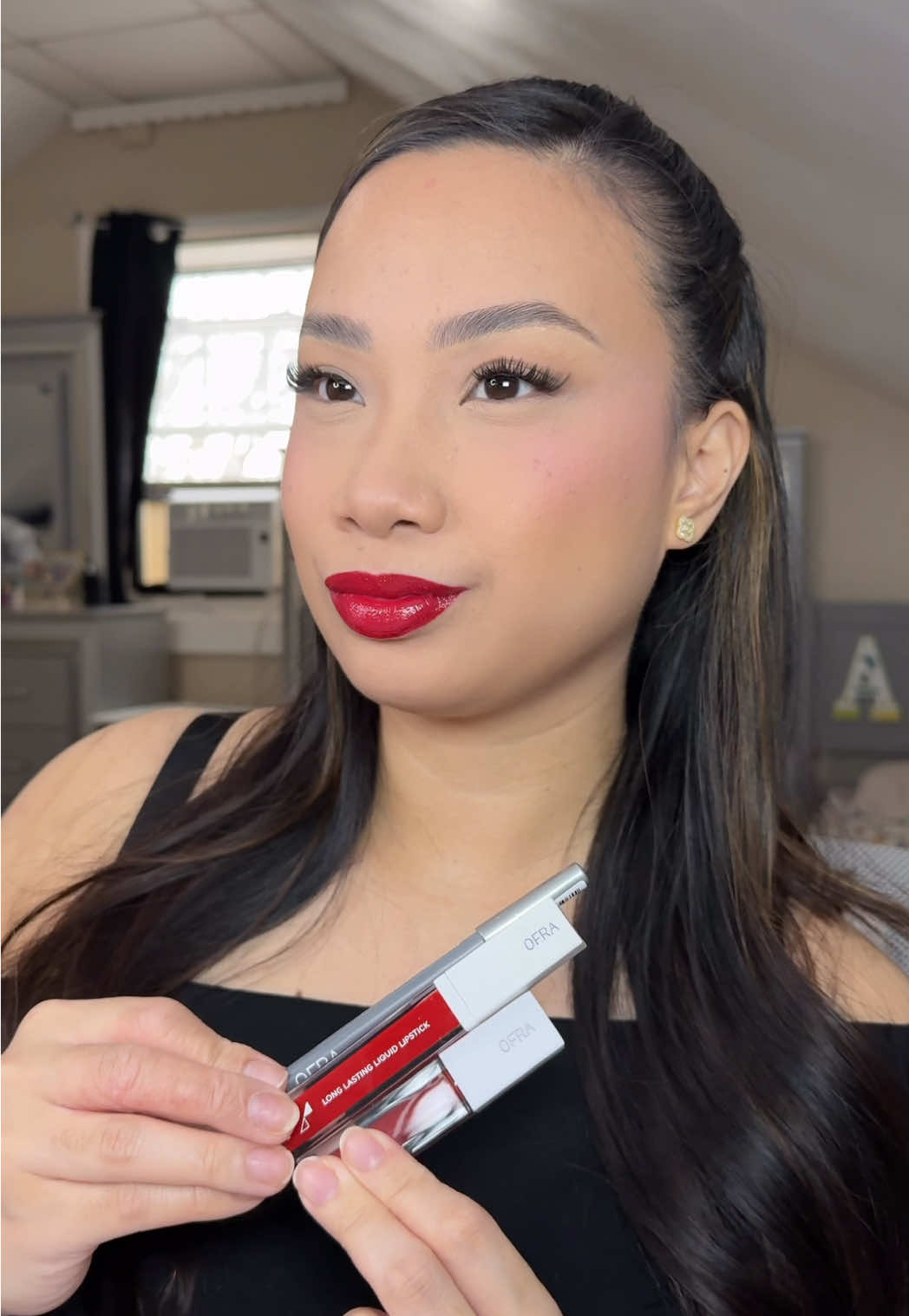 TikTok post by @anjane.xo for OFRA Cosmetics. Caption reads: [...] Christmas lip combo 💋 @OFRA Cosmetics, LLC....