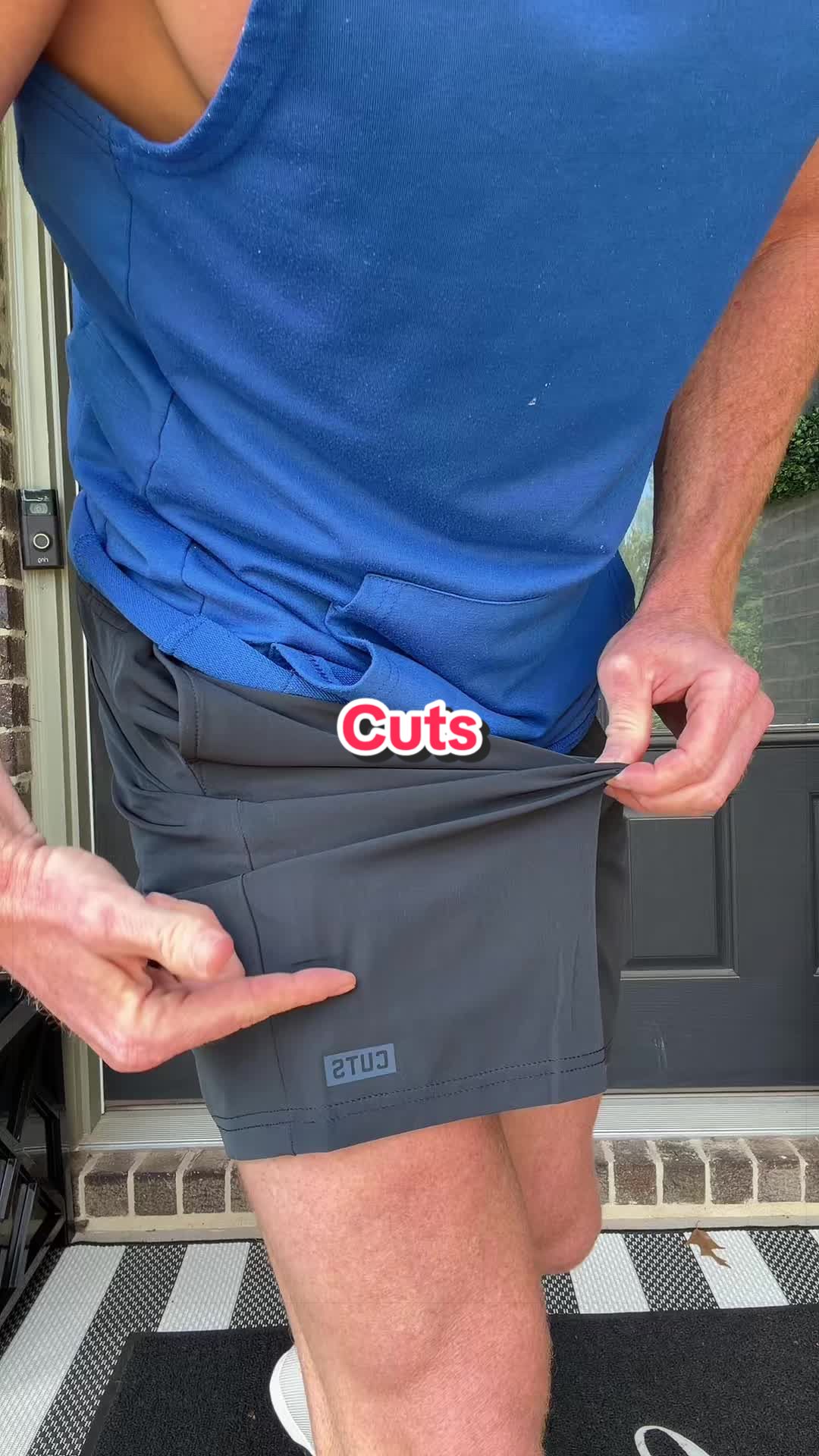 TikTok post by @dustinrwalton for Cuts Clothing. Caption reads: @Cuts Clothing crossover shorts. #shorts #workout....