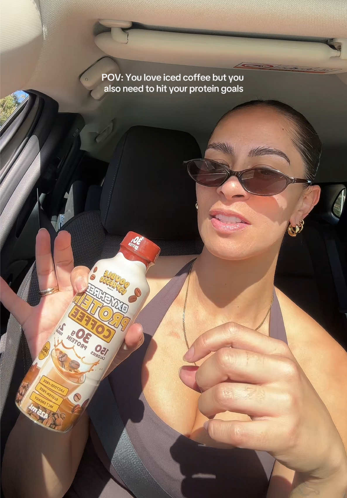 TikTok post by @jazzyfzl for OxyShred Energy. Caption reads: [...] ✨ Low cals ✨ a gym girls dream tbh @OxyShred....