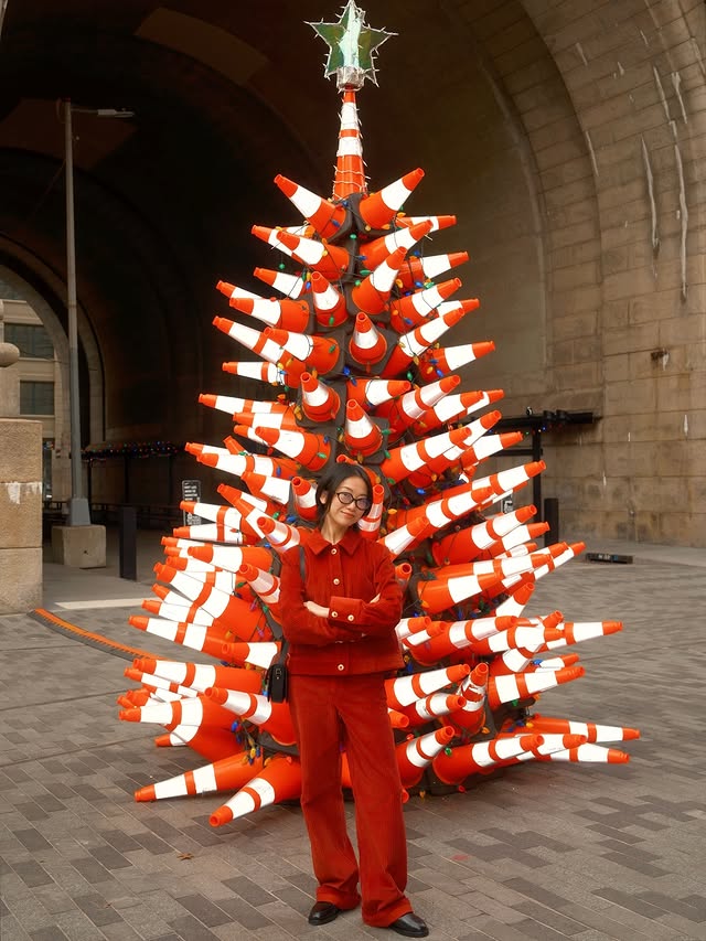 Instagram post by @vivid for Sezane. Caption reads: • ‘tis the season to be festive and dressed in red....
